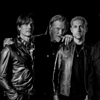 Queens of the Stone Age digs into dark days on &#8216;In Times New Roman&#8230;&#8217;