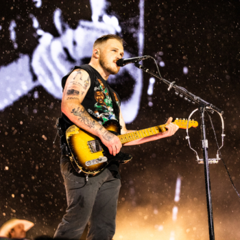 Zach Bryan and fans power through the heavy weather at The Linc