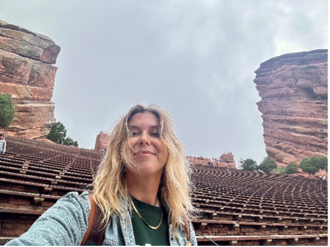 World Cafe host Raina Douris snaps a selfie while touring Red Rocks Amphitheatre. 