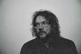 A man posing for a photo