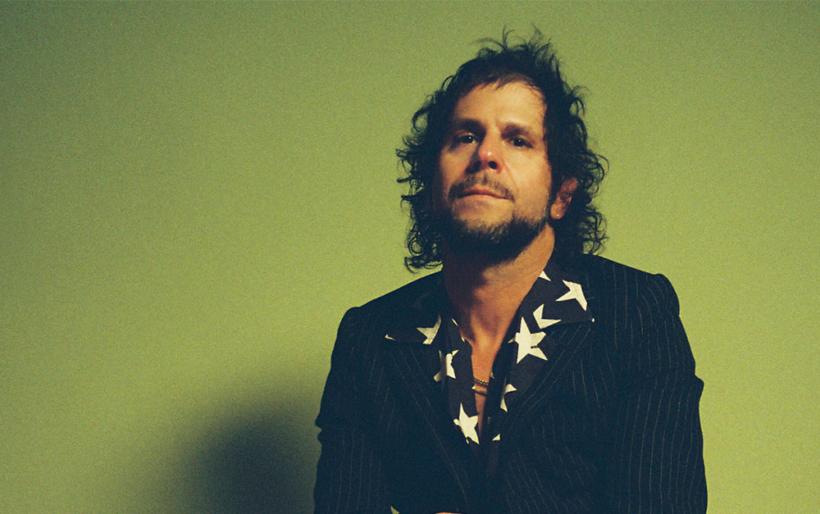 A guy sitting in chair